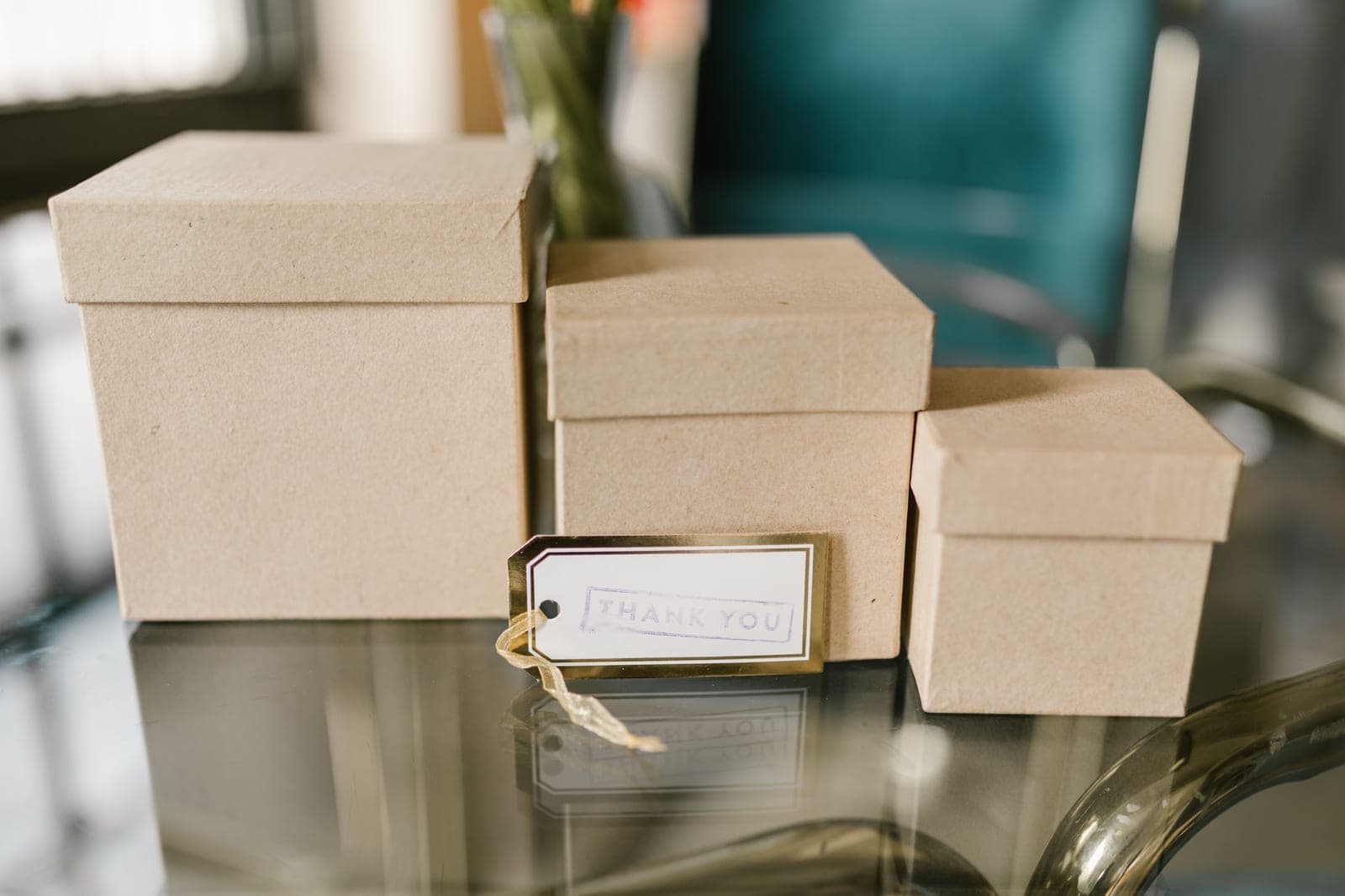 Gift boxes of different sizes on a bright table