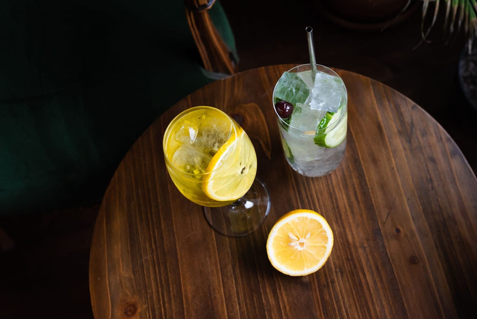 A gin and tonic with citrus in bright daylight
